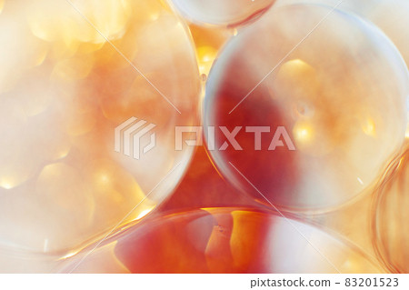 Oil bubbles close up. circles of water macro. abstract orange and fiery red background 83201523