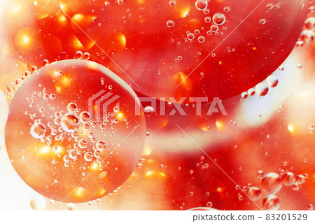 Oil bubbles close up. circles of water macro. abstract orange and fiery red background Oil bubbles close up. circles of water macro. abstract orange and fiery red background 83201529