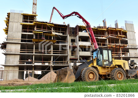 Formworks and pouring concrete through a oncrete pump truck connected to a ready-mixed truck. Formworks and pouring concrete through a oncrete pump truck connected to a ready-mixed truck. 83201866