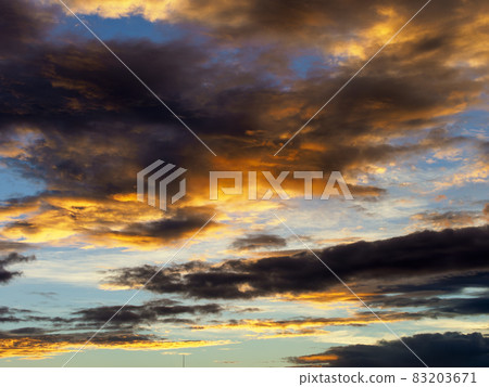 Clouds shining golden in the sun Clouds shining golden in the sun 83203671