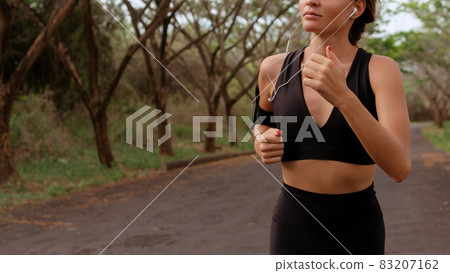 Beautiful girl go in for sports. autumn Beautiful girl go in for sports. autumn 83207162