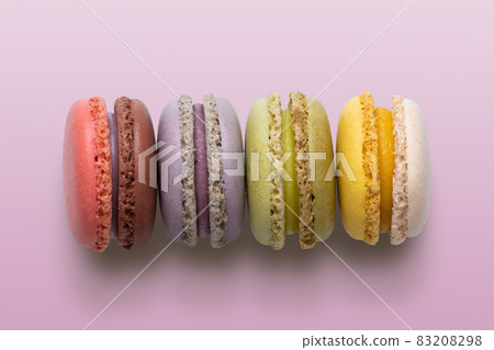 Cake macaron or macaroon on pink background Cake macaron or macaroon on pink background 83208298