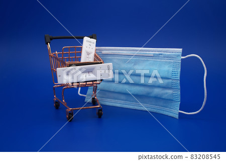 Covid-19 and shopping concept with mask, cart and tests Covid-19 and shopping concept with mask, cart and tests 83208545