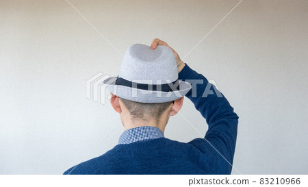 Japanese man takes off his hat and greets Japanese man takes off his hat and greets 83210966