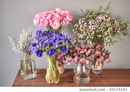 Set of white, pink and magenta flowers for Interior decorations. The work of the florist at a flower shop. Fresh cut flower. Set of white, pink and magenta flowers for Interior decorations. The work of the florist at a flower shop. Fresh cut flower. 83214334