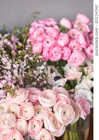 Set of white, pink and magenta flowers for Interior decorations. The work of the florist at a flower shop. Fresh cut flower. Set of white, pink and magenta flowers for Interior decorations. The work of the florist at a flower shop. Fresh cut flower. 83214342