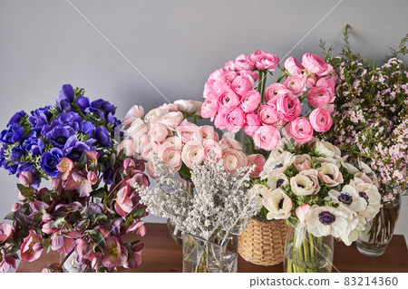 Set of white, pink and magenta flowers for Interior decorations. The work of the florist at a flower shop. Fresh cut flower. Set of white, pink and magenta flowers for Interior decorations. The work of the florist at a flower shop. Fresh cut flower. 83214360