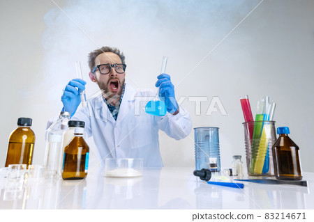 One young scientist, chemist or doctor conducts chemical research at pharmaceutical lab. Concept of chemistry, medicine. One young scientist, chemist or doctor conducts chemical research at pharmaceutical lab. Concept of chemistry, medicine. 83214671