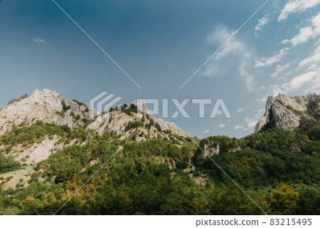 A view of the accursed mountains in the Grebaje Valley. Prokletije, also known as the Albanian Alps and the Accursed Mountains, is a mountain range on the Balkan peninsula, extending from northern A view of the accursed mountains in the Grebaje Valley. Prokletije, also known as the Albanian Alps and the Accursed Mountains, is a mountain range on the Balkan peninsula, extending from northern 83215495