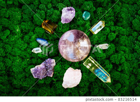 Healing crystals on brown background Healing crystals on brown background 83216514
