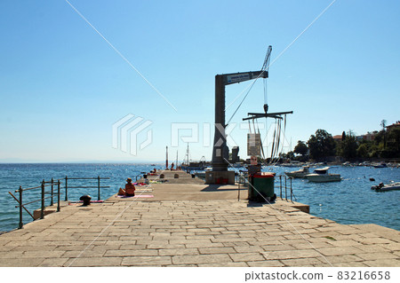 View from Ika's seaside promenade, harbor, Adriatic coast, Kvarner bay, city details, Croatia View from Ika's seaside promenade, harbor, Adriatic coast, Kvarner bay, city details, Croatia 83216658