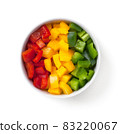 Cut Pepper Pieces In White Bowl Isolated 83220067