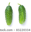 Two Fresh Green Cucumbers Isolated On White 83220334