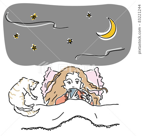 A woman enjoying a smartphone in bed A woman enjoying a smartphone in bed 83221244