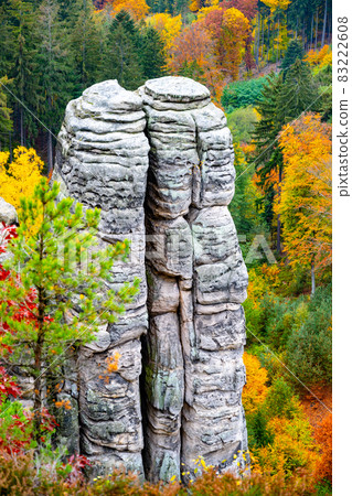 Sandstone rock formation in vibrant autumn forest Sandstone rock formation in vibrant autumn forest 83222608