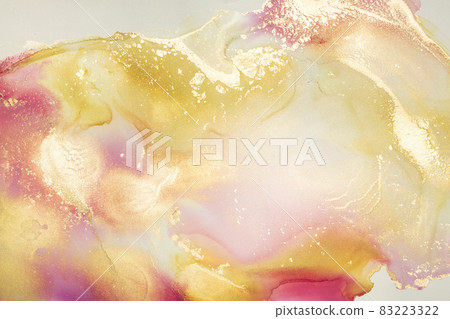 Luxury abstract fluid art painting in alcohol ink technique, mixture of pink and gold paints. Imitation of marble stone cut, glowing golden veins. Tender and dreamy design. Luxury abstract fluid art painting in alcohol ink technique, mixture of pink and gold paints. Imitation of marble stone cut, glowing golden veins. Tender and dreamy design. 83223322