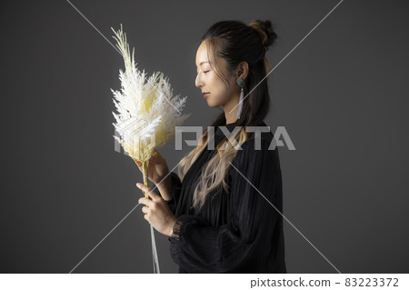 Female in black blouse Female in black blouse 83223372