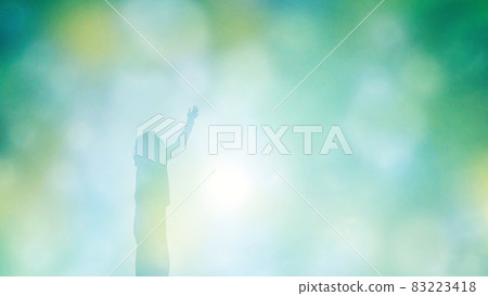Woman raising her hand sideways_blue white light blurred background 83223418