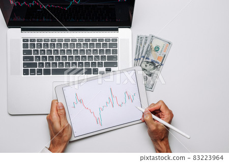 Investment strategy. Investment business technology app on digital screen. Finance application for sell, buy and analysis profit dividend statistics. Forex trading background. Investment strategy. Investment business technology app on digital screen. Finance application for sell, buy and analysis profit dividend statistics. Forex trading background. 83223964