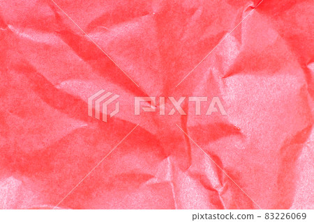 Grunge wrinkled red color paper textured background Grunge wrinkled red color paper textured background 83226069