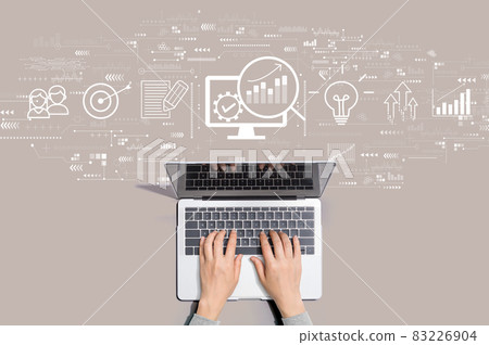 Marketing Strategy concept with person using laptop Marketing Strategy concept with person using laptop 83226904
