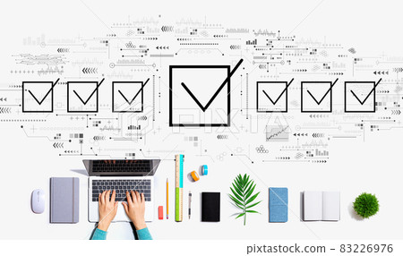Checklist concept with person using a laptop 83226976