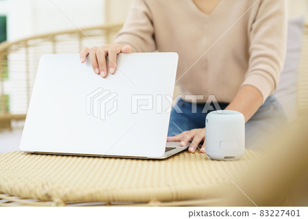 Close up women hand using computer laptop Close up women hand using computer laptop 83227401