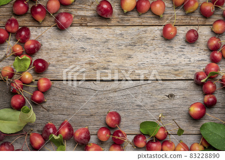 rustic wood texture with red crab apples rustic wood texture with red crab apples 83228890