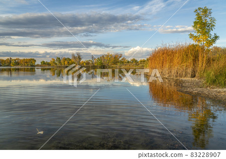 calm lake at sunset in northern Colorado calm lake at sunset in northern Colorado 83228907