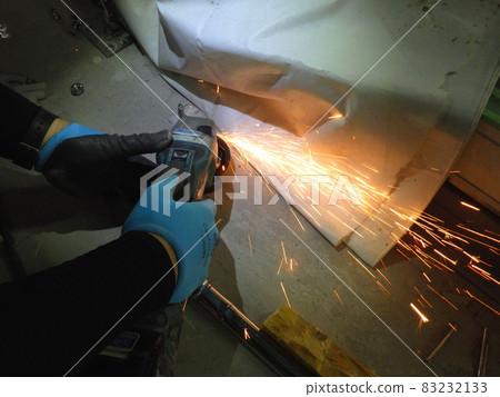 Baby sander processing, metal processing with sparks, cutting tools Baby sander processing, metal processing with sparks, cutting tools 83232133