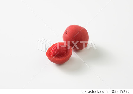 Umeboshi (small grains) on a white background Umeboshi (small grains) on a white background 83235252