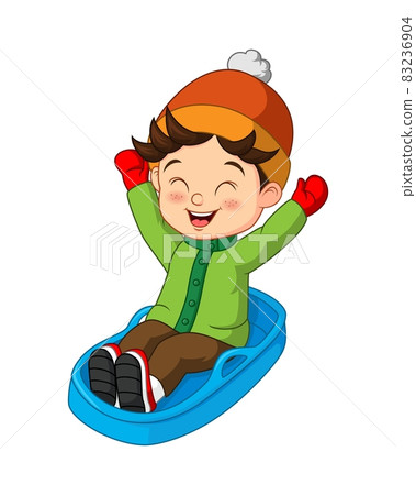Cute little boy sledding down a hill Cute little boy sledding down a hill 83236904