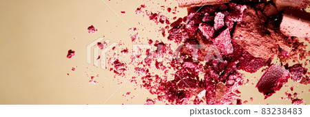 Crushed cosmetics, mineral organic eyeshadow, blush and cosmetic powder isolated on golden background, makeup and beauty banner, flatlay design 83238483