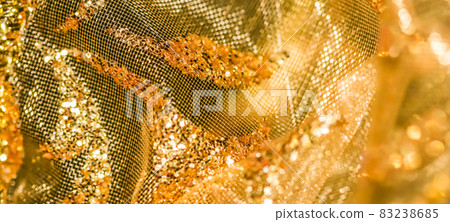 Golden abstract blur defocused background. Concept for New Years Eve, Christmas and happy holidays Golden abstract blur defocused background. Concept for New Years Eve, Christmas and happy holidays 83238685