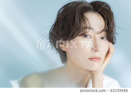 Short-haired woman white shirt Short-haired woman white shirt 83239486