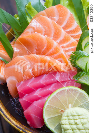 Sashimi (japanese food). Sliced raw seafood in a bowl. 83240390