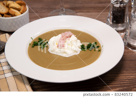 Lentil cream recipe with bacon whipped cream, vegetarian food 83240572