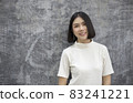 Portrait of young beautiful sexy asian woman facial treatment relax. Smile happy face fashion asian girl looking. Lifestyle japanese makeup smart people glow skin beauty, girl next door concept 83241221