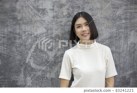 Portrait of young beautiful sexy asian woman facial treatment relax. Smile happy face fashion asian girl looking. Lifestyle japanese makeup smart people glow skin beauty, girl next door concept 83241221