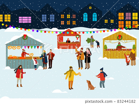 People at the winter fair in the evening. Christmas Fair, holiday. 83244182