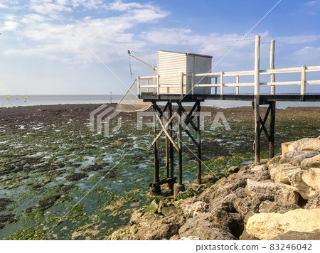 Traditional fishing cabin and net - Carrelet - Saint Georges de Didonne, France Traditional fishing cabin and net - Carrelet - Saint Georges de Didonne, France 83246042