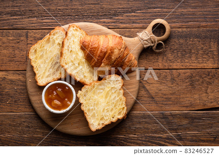 French croissant cut in halves 83246527