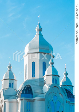 Modern church religious architecture Christian building against the blue sky 83248539