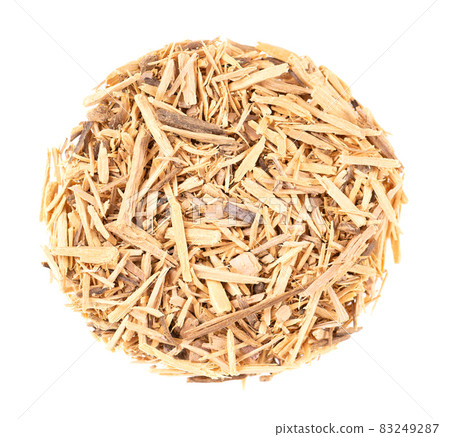 Muira Puama herbal tea, isolated on white background. Natural potency wood, medicinal plant, dry tea. Ptychopetalum olacoides. Top view. 83249287