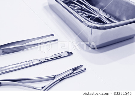 Surgical instruments isolated on the white background Surgical instruments isolated on the white background 83251545