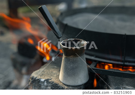 Close-up of a Turk with coffee on a blurred background. Close-up of a Turk with coffee on a blurred background. 83251903