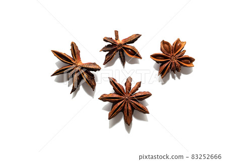 Fragrant anise isolated on a white background. Stars of dried flavorful anise isolated on a white background 83252666