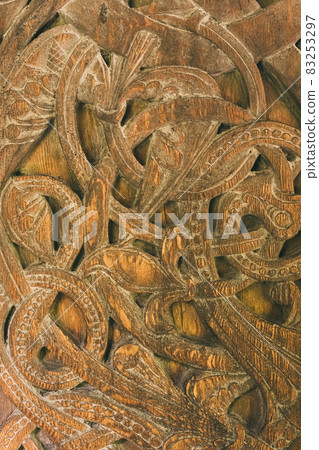 Borgund, Norway. Carved Details Of Famous Wooden Norwegian Landmark Stavkirke. Ancient Old Wooden Triple Nave Stave Church. Close View, Details Borgund, Norway. Carved Details Of Famous Wooden Norwegian Landmark Stavkirke. Ancient Old Wooden Triple Nave Stave Church. Close View, Details 83253297