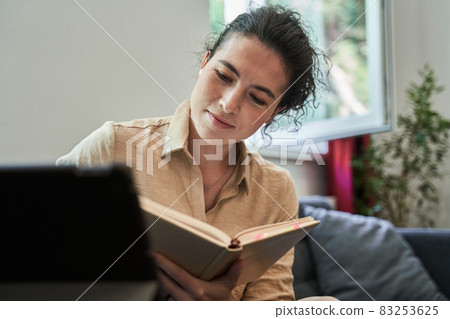 Female psychologist working with patient online while sitting in her office 83253625