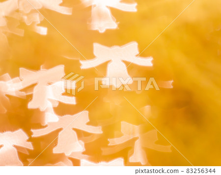 Background material: Reflection of ribbon and bell silhouette pattern Orange Background material: Reflection of ribbon and bell silhouette pattern Orange 83256344